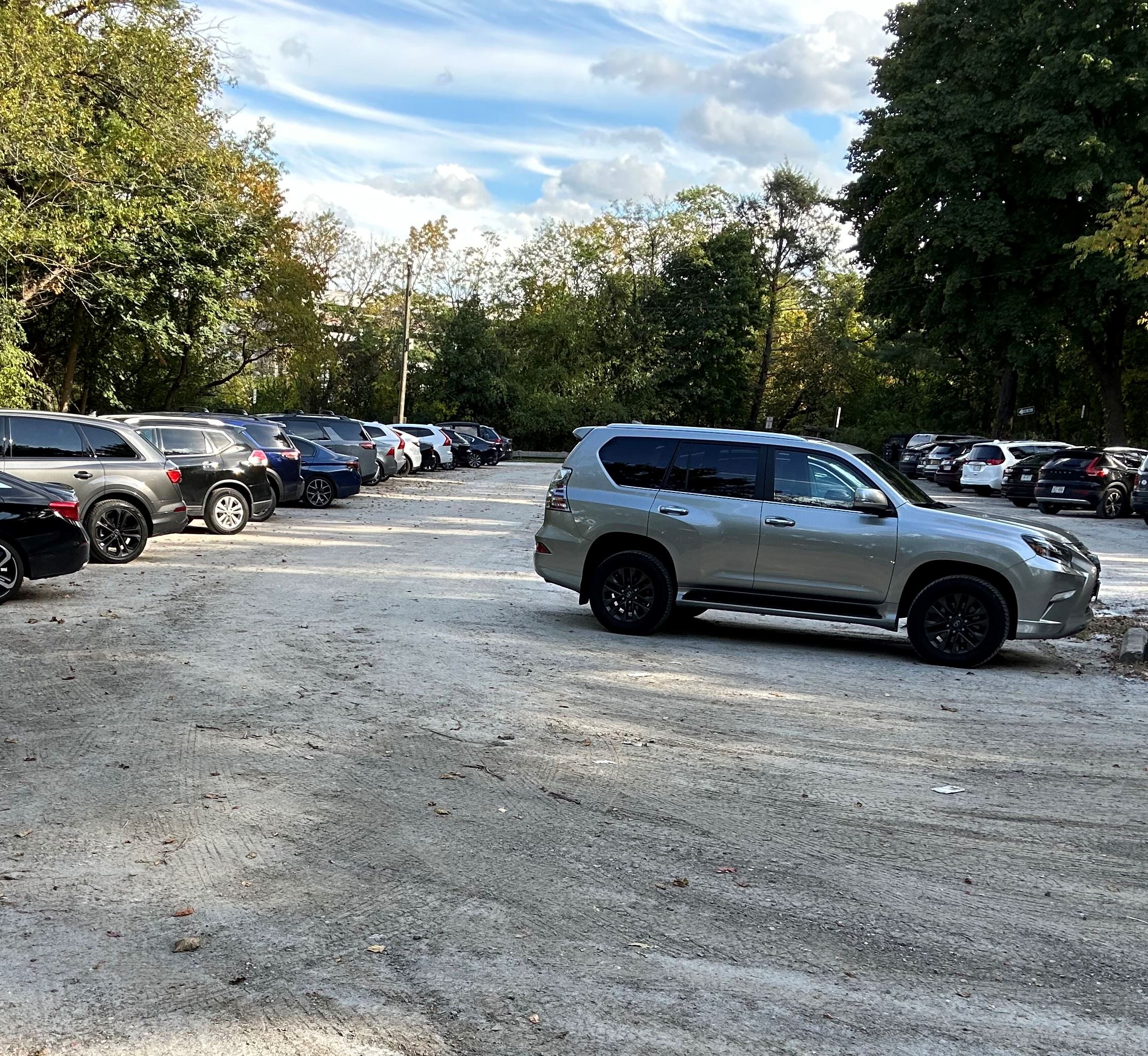 Fisher Lane parking lot with parked cars
